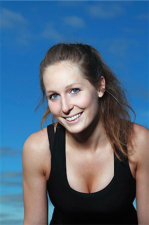 simsearch:6102-06965505,k - Portrait of smiling young woman Stock Photo - Premium Royalty-Free, Code: 6102-06965744