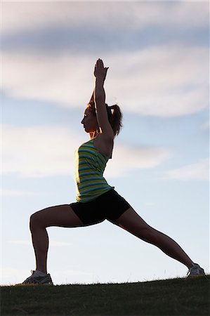 simsearch:6102-08942226,k - Young woman doing yoga Foto de stock - Sin royalties Premium, Código: 6102-06965751