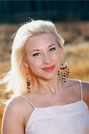 simsearch:6102-06965505,k - Portrait of smiling young woman Stock Photo - Premium Royalty-Free, Code: 6102-06965763