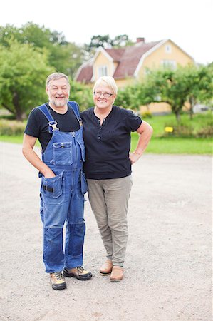 Senior couple standing together Stock Photo - Premium Royalty-Free, Code: 6102-07158355