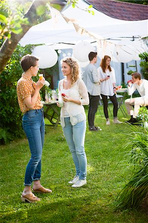 eat standing - People having party in garden Stock Photo - Premium Royalty-Free, Code: 6102-07282639