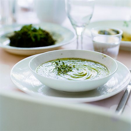 Green soup on table Stock Photo - Premium Royalty-Free, Code: 6102-07455715