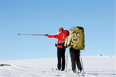 simsearch:6102-07158155,k - Two women doing cross country skiing, Ammarnas, Lapland, Sweden Stock Photo - Premium Royalty-Free, Code: 6102-07455804