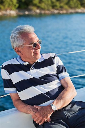 Smiling senior man on boat, Croatia Stock Photo - Premium Royalty-Free, Code: 6102-07602703