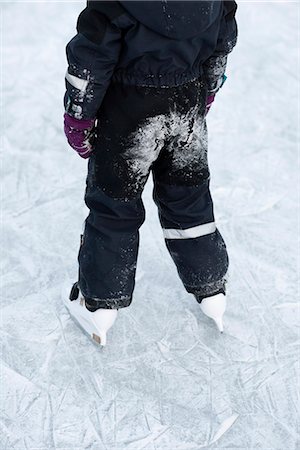 simsearch:6102-08520961,k - Child ice skating, low section, Sweden Stock Photo - Premium Royalty-Free, Code: 6102-07768447