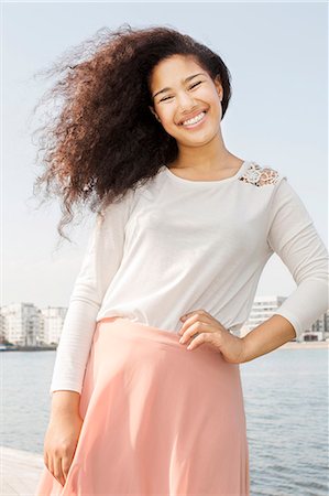 Smiling teenage girl, Sweden Stock Photo - Premium Royalty-Free, Code: 6102-07768547