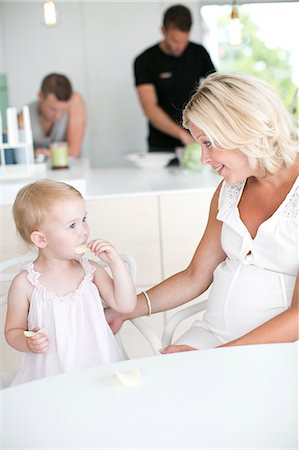 simsearch:6102-08566788,k - Pregnant woman with daughter, Stockholm, Sweden Stock Photo - Premium Royalty-Free, Code: 6102-07768652