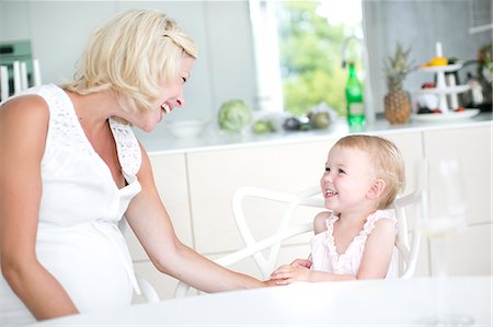 simsearch:6102-08566788,k - Pregnant woman with daughter, Stockholm, Sweden Stock Photo - Premium Royalty-Free, Code: 6102-07768656