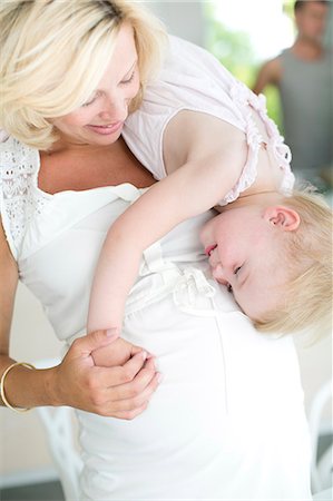 simsearch:6102-08566788,k - Pregnant woman playing with daughter, Stockholm, Sweden Stock Photo - Premium Royalty-Free, Code: 6102-07768663