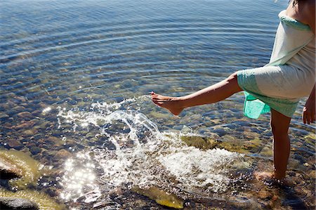 Woman splashing water, Sweden Stock Photo - Premium Royalty-Free, Code: 6102-07768697