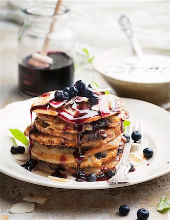 simsearch:6102-07157973,k - Pancakes with sauce and blueberries Stock Photo - Premium Royalty-Free, Code: 6102-08062918