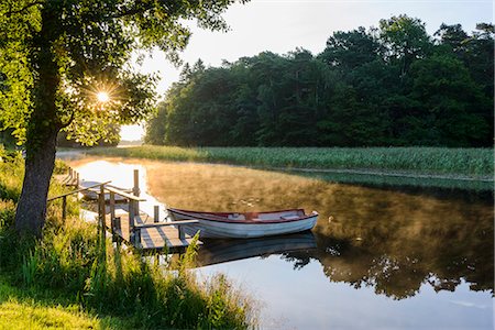 simsearch:862-07690164,k - Rowboat moored at jetty Stock Photo - Premium Royalty-Free, Code: 6102-08000485