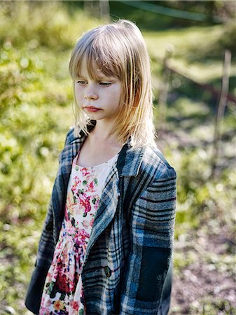 simsearch:6102-08000621,k - Girl wearing checked coat looking away Stock Photo - Premium Royalty-Free, Code: 6102-08001053