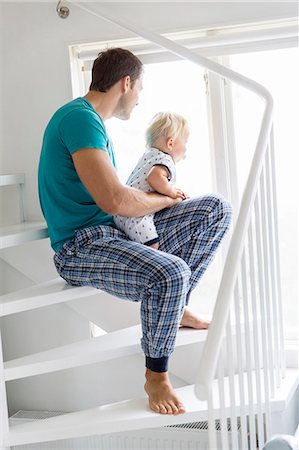 stairs children - Father with son on stairs Stock Photo - Premium Royalty-Free, Code: 6102-08001117