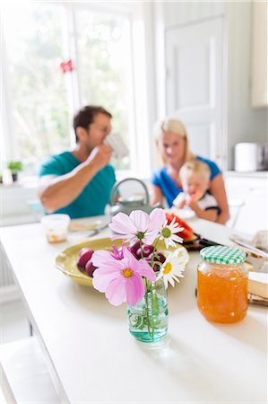 simsearch:6102-07157973,k - Breakfast on table, family on background Stock Photo - Premium Royalty-Free, Code: 6102-08001122