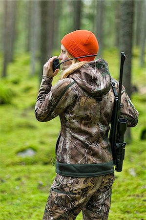 simsearch:6102-06337050,k - Woman hunting in forest Stock Photo - Premium Royalty-Free, Code: 6102-08184088