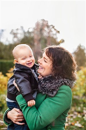 Smiling mother with son Stock Photo - Premium Royalty-Free, Code: 6102-08120094
