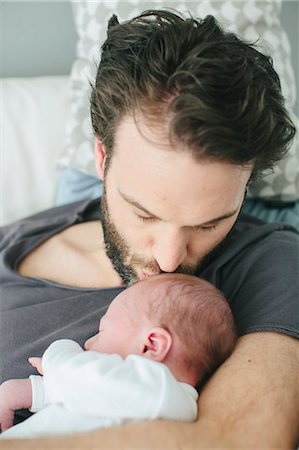 pictures of new born baby rooms - Mid adult man with newborn baby Stock Photo - Premium Royalty-Free, Code: 6102-08120626