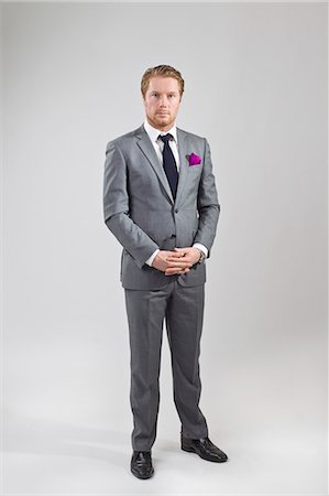 simsearch:6102-07455789,k - Man wearing suit, studio shot Stock Photo - Premium Royalty-Free, Code: 6102-08270618