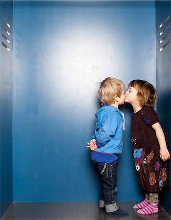 Boy and girl kissing Stock Photo - Premium Royalty-Free, Code: 6102-08271033