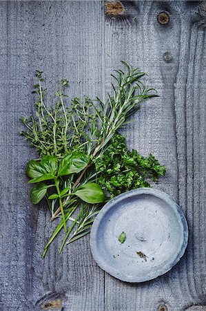 simsearch:600-07311268,k - Herbs on wooden background Stock Photo - Premium Royalty-Free, Code: 6102-08271422