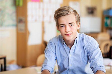 sweden blond boy - Teenage boy in classroom Stock Photo - Premium Royalty-Free, Code: 6102-08278744
