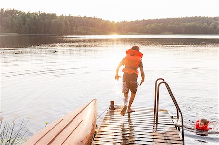 Children at lake Stock Photo - Premium Royalty-Free, Code: 6102-08481178