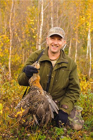 simsearch:6102-06337050,k - Man with dead Common Pheasant Stock Photo - Premium Royalty-Free, Code: 6102-08558830