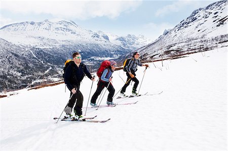 simsearch:6102-07158155,k - Three people skiing Stock Photo - Premium Royalty-Free, Code: 6102-08559023