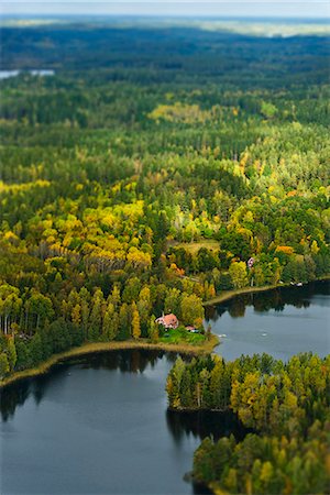 simsearch:6102-06026084,k - Aerial view of house in forest, Sweden Stock Photo - Premium Royalty-Free, Code: 6102-08559279