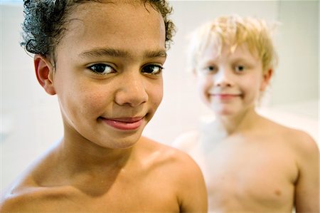 preteen boy shirtless - Two boys in a bathroom, Sweden. Stock Photo - Premium Royalty-Free, Code: 6102-08559571