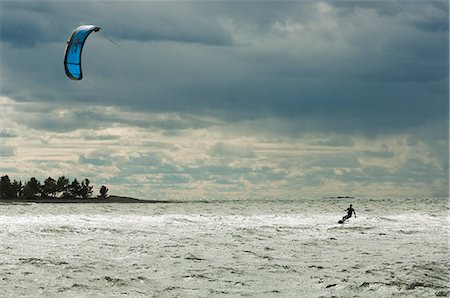 sparkling water (not drinking water) - Scandinavia, Sweden, Man kiteboarding Stock Photo - Premium Royalty-Free, Code: 6102-08559661