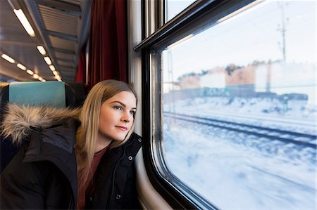 Youth woman in train Stock Photo - Premium Royalty-Free, Code: 6102-08566580