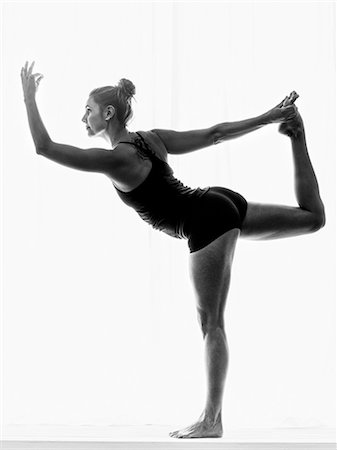 simsearch:6102-08942215,k - Woman doing yoga Stock Photo - Premium Royalty-Free, Code: 6102-08641988