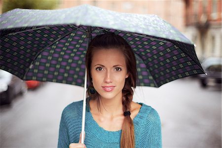 Woman with umbrella Photographie de stock - Premium Libres de Droits, Code: 6102-08642093