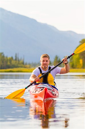 Man kayaking Stock Photo - Premium Royalty-Free, Code: 6102-08746740