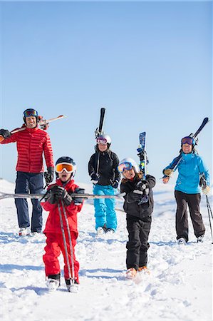 simsearch:6102-07158155,k - Father with children skiing Stock Photo - Premium Royalty-Free, Code: 6102-08746786