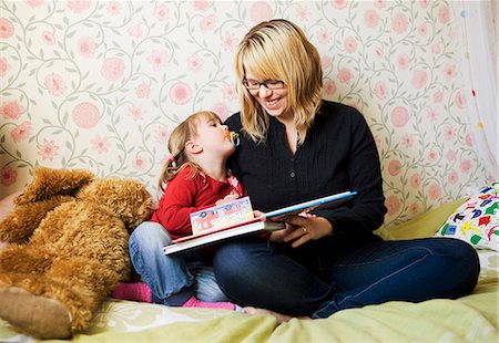 simsearch:6102-08566788,k - Mother reading book to her daughter Stock Photo - Premium Royalty-Free, Code: 6102-08760772