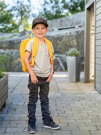 Smiling boy with backpack Stock Photo - Premium Royalty-Free, Code: 6102-08858679