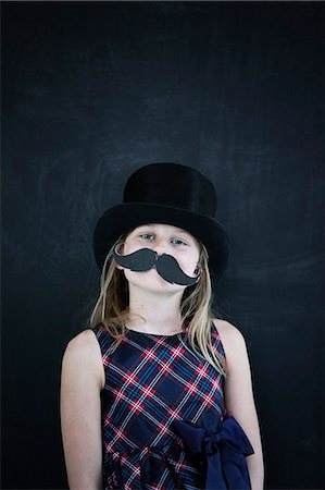 simsearch:6102-07455789,k - Portrait of girl with top hat and moustache Stock Photo - Premium Royalty-Free, Code: 6102-08881772