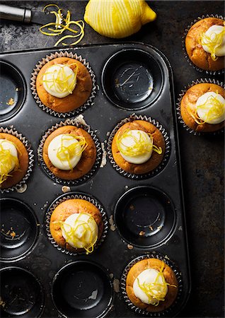 simsearch:6102-07157973,k - Muffins with lemon peel on baking pan Stock Photo - Premium Royalty-Free, Code: 6102-08882025