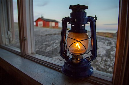 sweden window lamp - Kerosene lamp on window sill Stock Photo - Premium Royalty-Free, Code: 6102-08885578