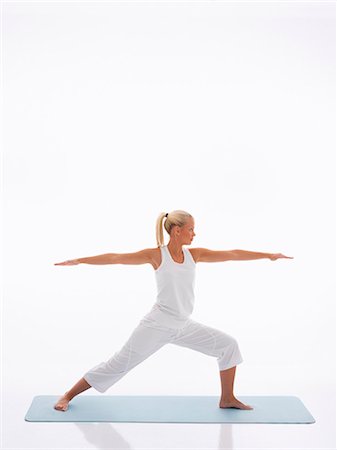 simsearch:6102-08942226,k - Teenage girl doing yoga Foto de stock - Sin royalties Premium, Código: 6102-08800127