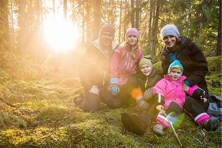 parecchi - Happy family in forest Fotografie stock - Premium Royalty-Free, Codice: 6102-08951591