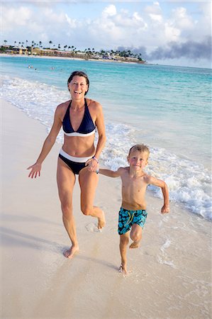 Mother with son on beach Stock Photo - Premium Royalty-Free, Code: 6102-08995130
