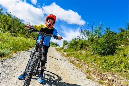 Boy on mountain bicycle Stock Photo - Premium Royalty-Free, Code: 6102-08995334