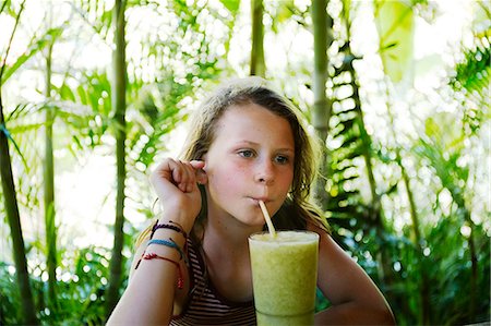 preteen girl topless - Girl having drink Stock Photo - Premium Royalty-Free, Code: 6102-08996068