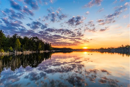 Sunset over lake Foto de stock - Sin royalties Premium, Código: 6102-08996791