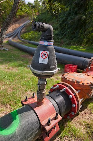 Wastewater pipeline and pump at a water treatment plant Stock Photo - Premium Royalty-Free, Code: 6105-05396538