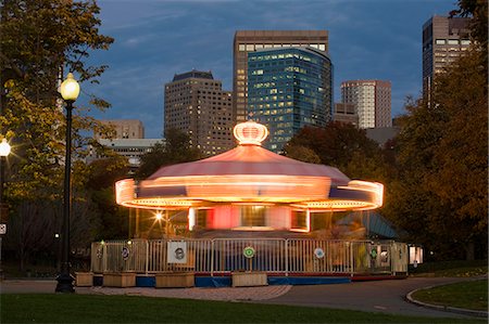 Carousel lit up in a park, Boston Common, Boston, Massachusetts, USA Stock Photo - Premium Royalty-Free, Code: 6105-05396677